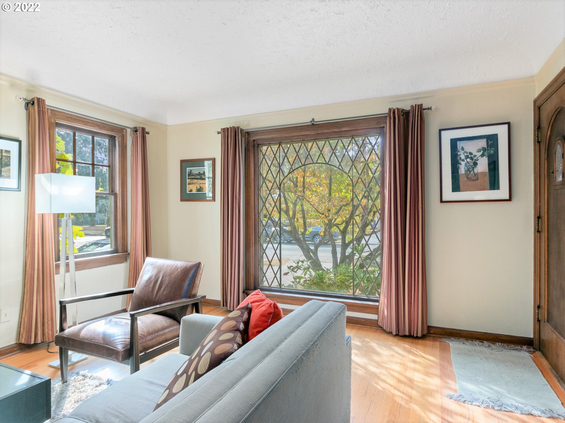 1742 Northeast 60th Avenue Portland, OR 97213 - Photo 4 of 32 a living room with furniture and a large window