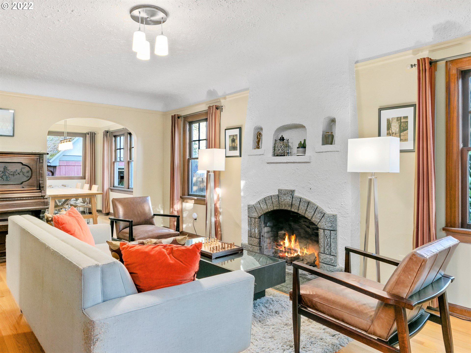 1742 Northeast 60th Avenue Portland, OR 97213 - Photo 5 of 32 a living room with furniture and a fireplace