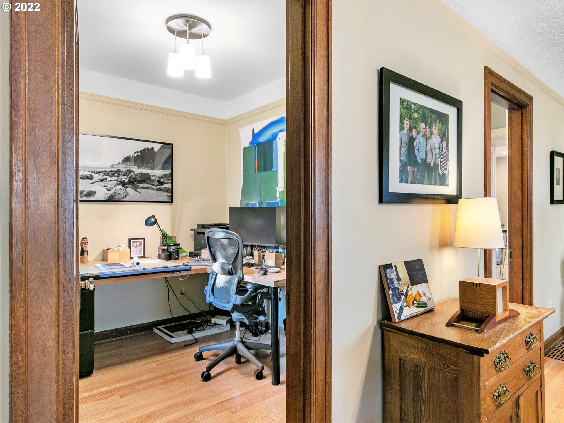 1742 Northeast 60th Avenue Portland, OR 97213 - Photo 6 of 32 a view of a workspace with furniture and a window