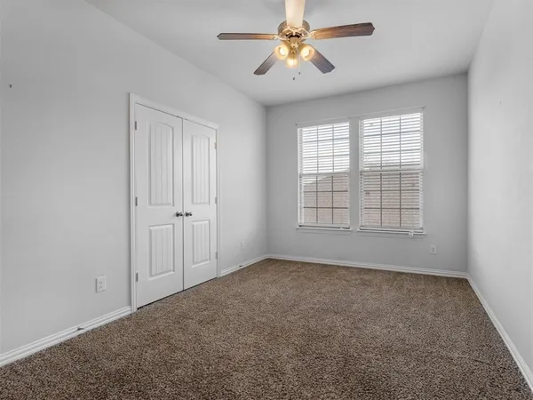 a picture of a bathroom with a shower