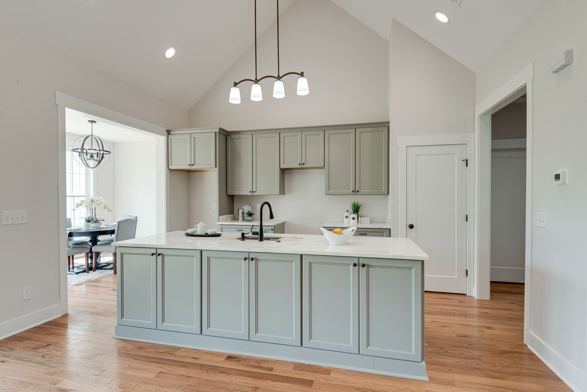 204 Stephen Street Dickson, TN 37055 - Photo 12 of 29 a kitchen with stainless steel appliances granite countertop a sink cabinets and wooden floor