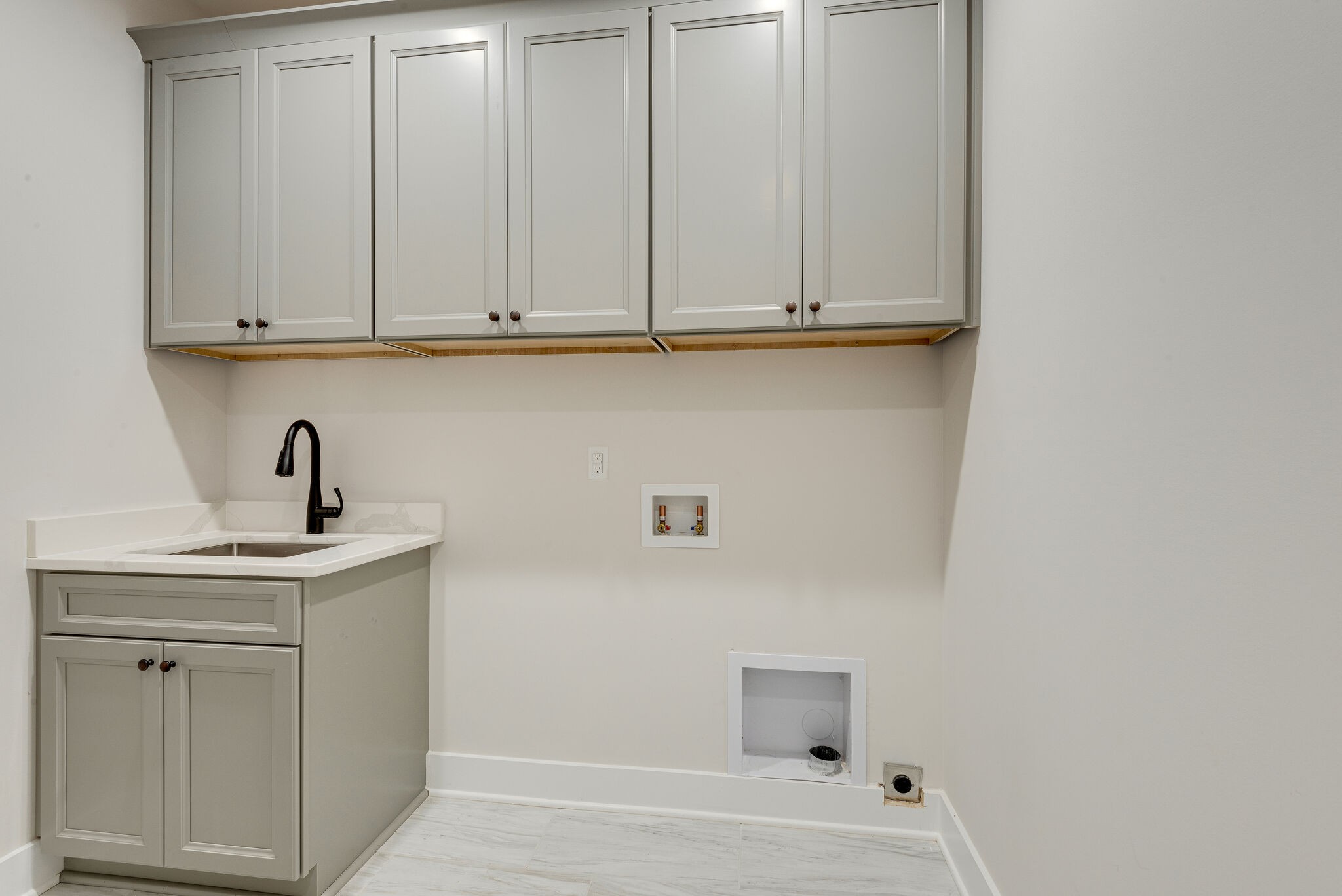 204 Stephen Street Dickson, TN 37055 - Photo 17 of 29 a bathroom with a sink and cabinets