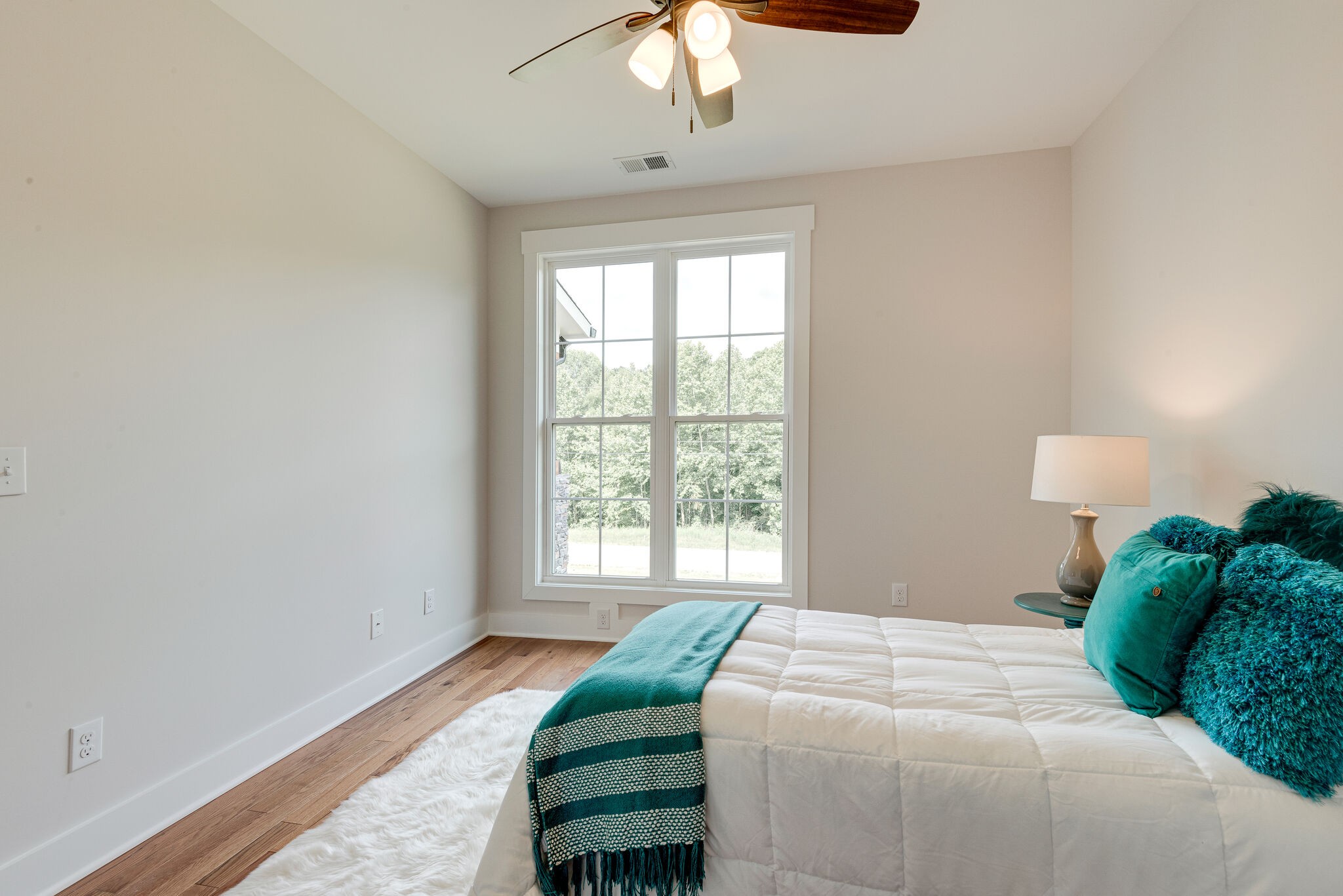 204 Stephen Street Dickson, TN 37055 - Photo 23 of 29 a bedroom with a bed and a chandelier