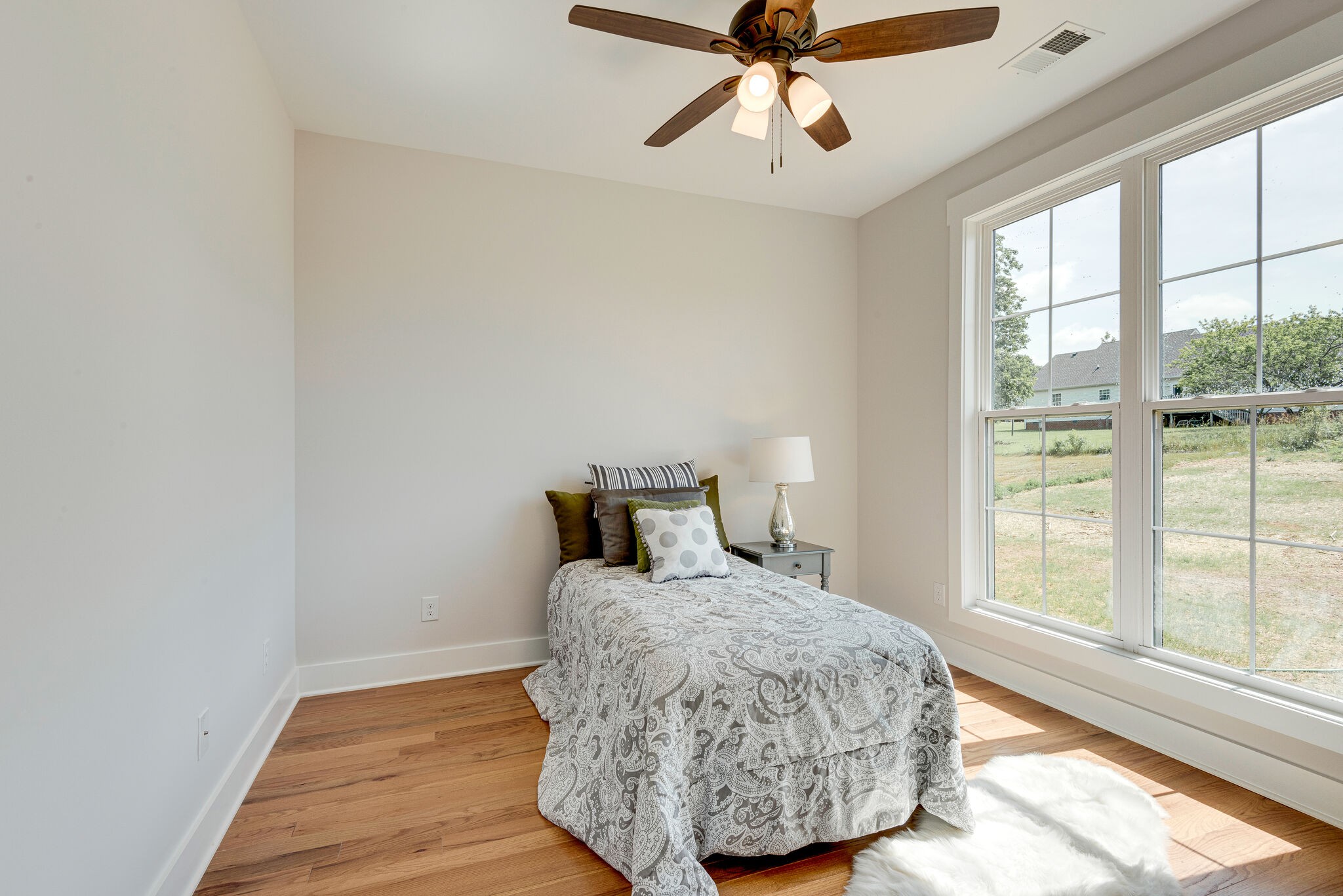204 Stephen Street Dickson, TN 37055 - Photo 26 of 29 a bedroom with a bed and large window