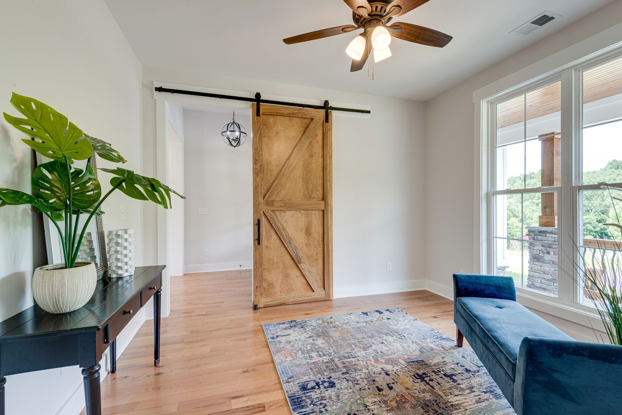 204 Stephen Street Dickson, TN 37055 - Photo 6 of 29 a living room with furniture and a potted plant