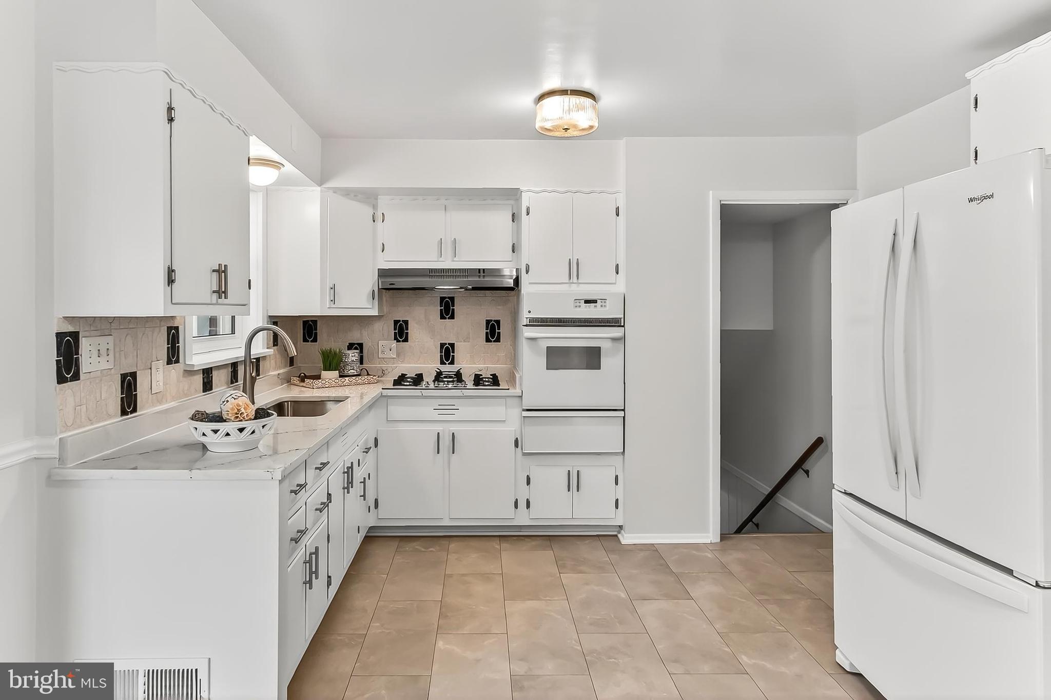 6824 Constance Drive Springfield, VA 22150 - Photo 19 of 67 Updated kitchen with quartz countertops!