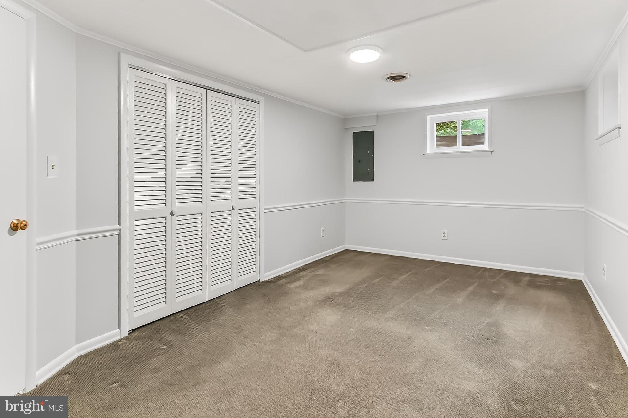 6824 Constance Drive Springfield, VA 22150 - Photo 41 of 67 Lower-level - Den/Bedroom 4 - front of home