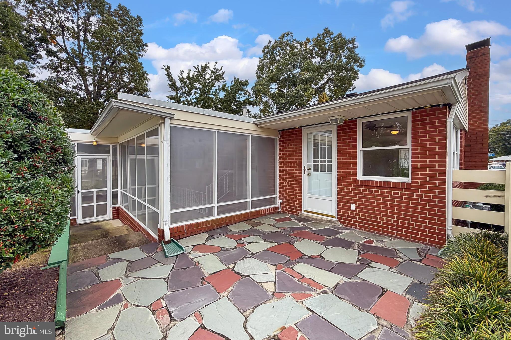 6824 Constance Drive Springfield, VA 22150 - Photo 55 of 67 Flagstone patio & screened porch