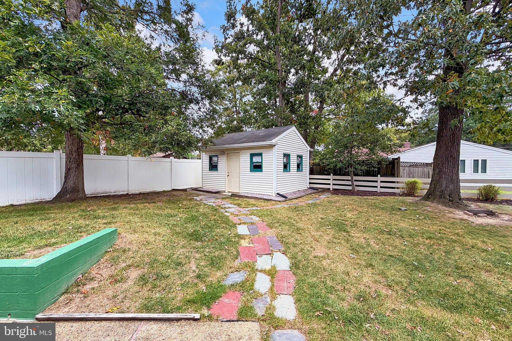 6824 Constance Drive Springfield, VA 22150 - Photo 61 of 67 Rear yard with lawn and storage shed