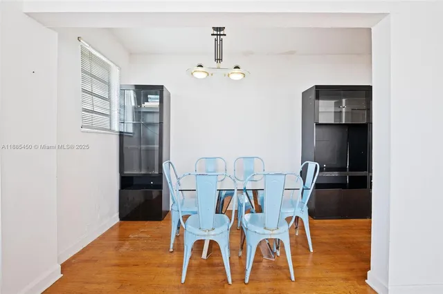 a kitchen with a sink and a stove top oven