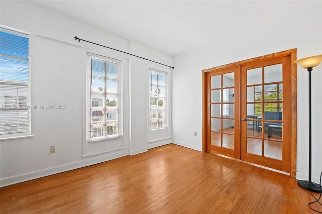 a view of empty room with closet