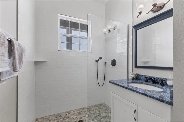 a view of balcony with furniture