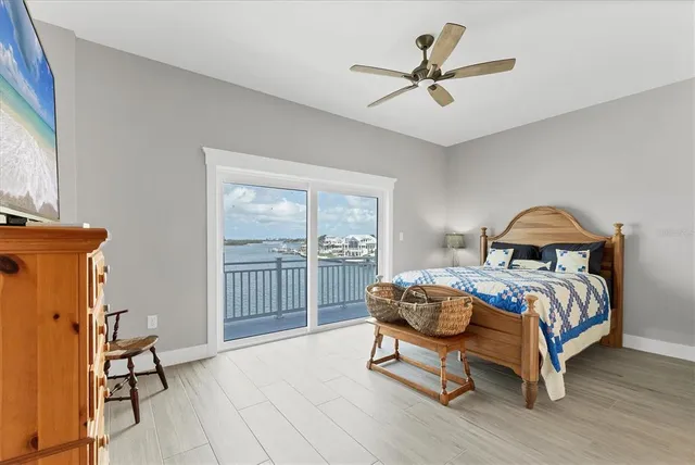 a view of a chairs and table in the balcony