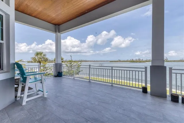 a view of a house with a garden and plants