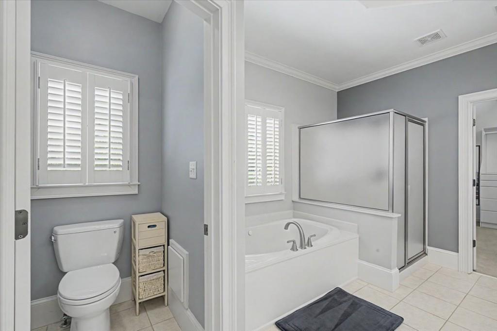 122 Ridge View Drive Ball Ground, GA 30107 - Photo 39 of 84 a bathroom with a bathtub toilet and sink