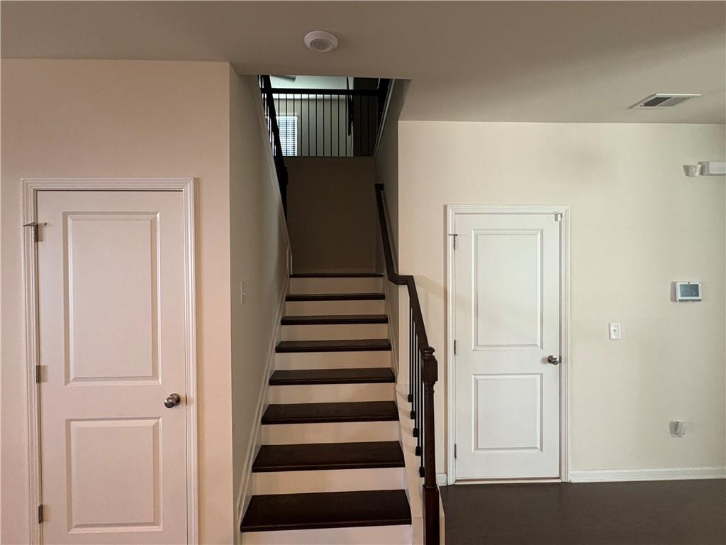 3424 Pratt Way Bethlehem, GA 30620 - Photo 12 of 23 a view of a hallway with wooden floor and staircase