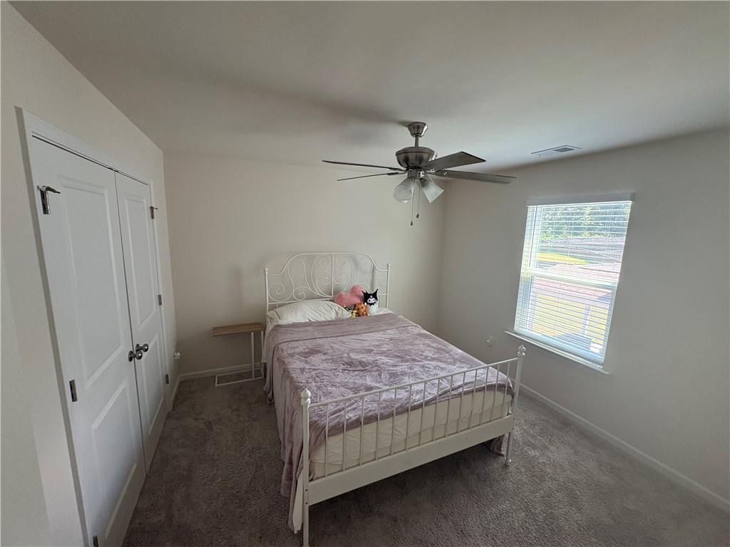 3424 Pratt Way Bethlehem, GA 30620 - Photo 16 of 23 a bedroom with a bed and a window