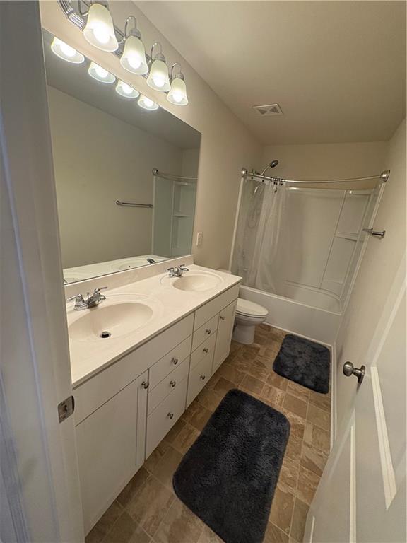 3424 Pratt Way Bethlehem, GA 30620 - Photo 19 of 23 a bathroom with a sink a toilet and a mirror