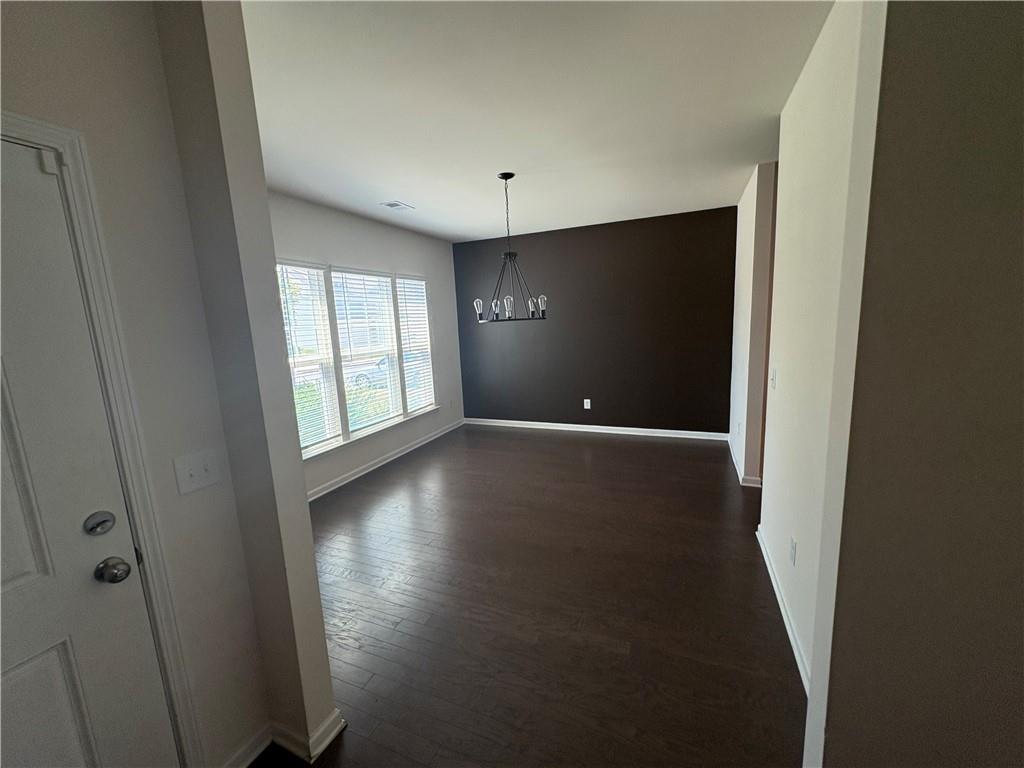 3424 Pratt Way Bethlehem, GA 30620 - Photo 4 of 23 an empty room with wooden floor and windows