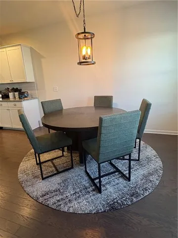 a view of a workspace with furniture