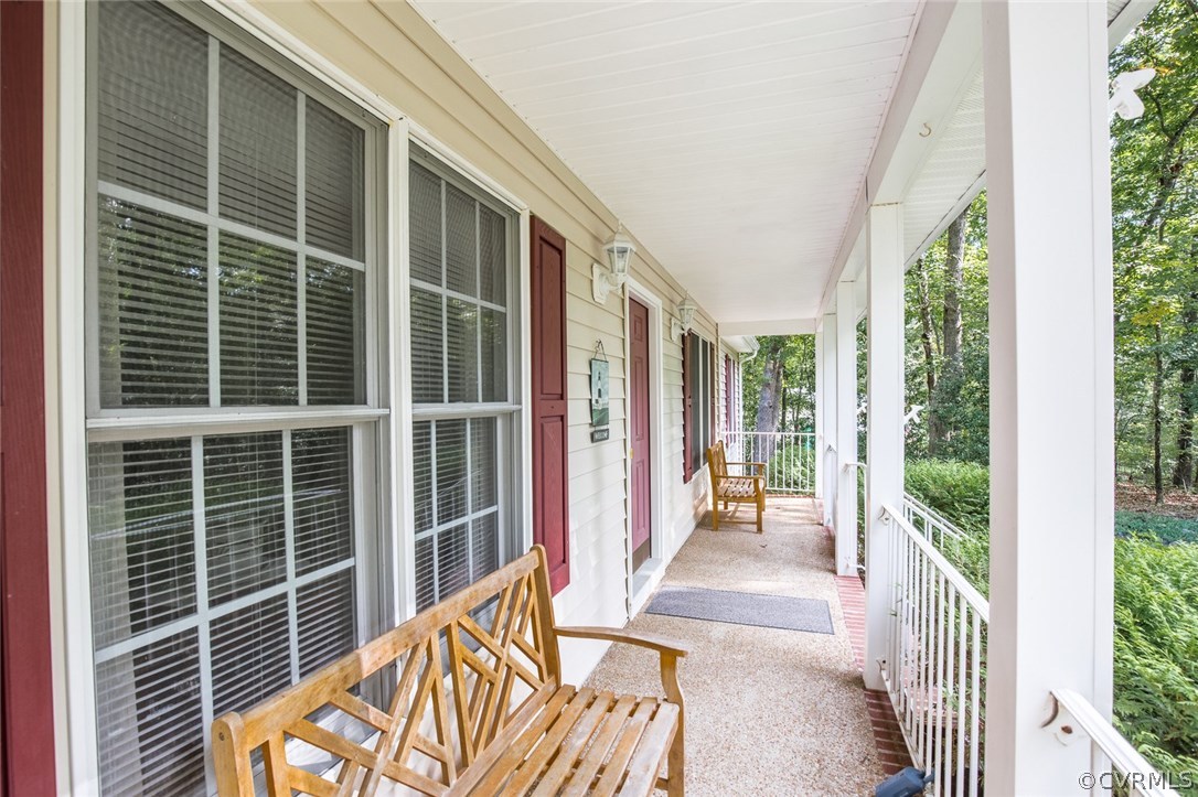 275 Spring Woods Road Montpelier, VA 23192 - Photo 3 of 26 Covered front porch overlooks lovely yard