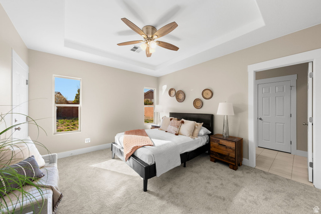 1570 South Rio Virgin Drive Washington, UT 84780 - Photo 25 of 71 Carpeted bedroom featuring a ceiling fan and a raised ceiling
