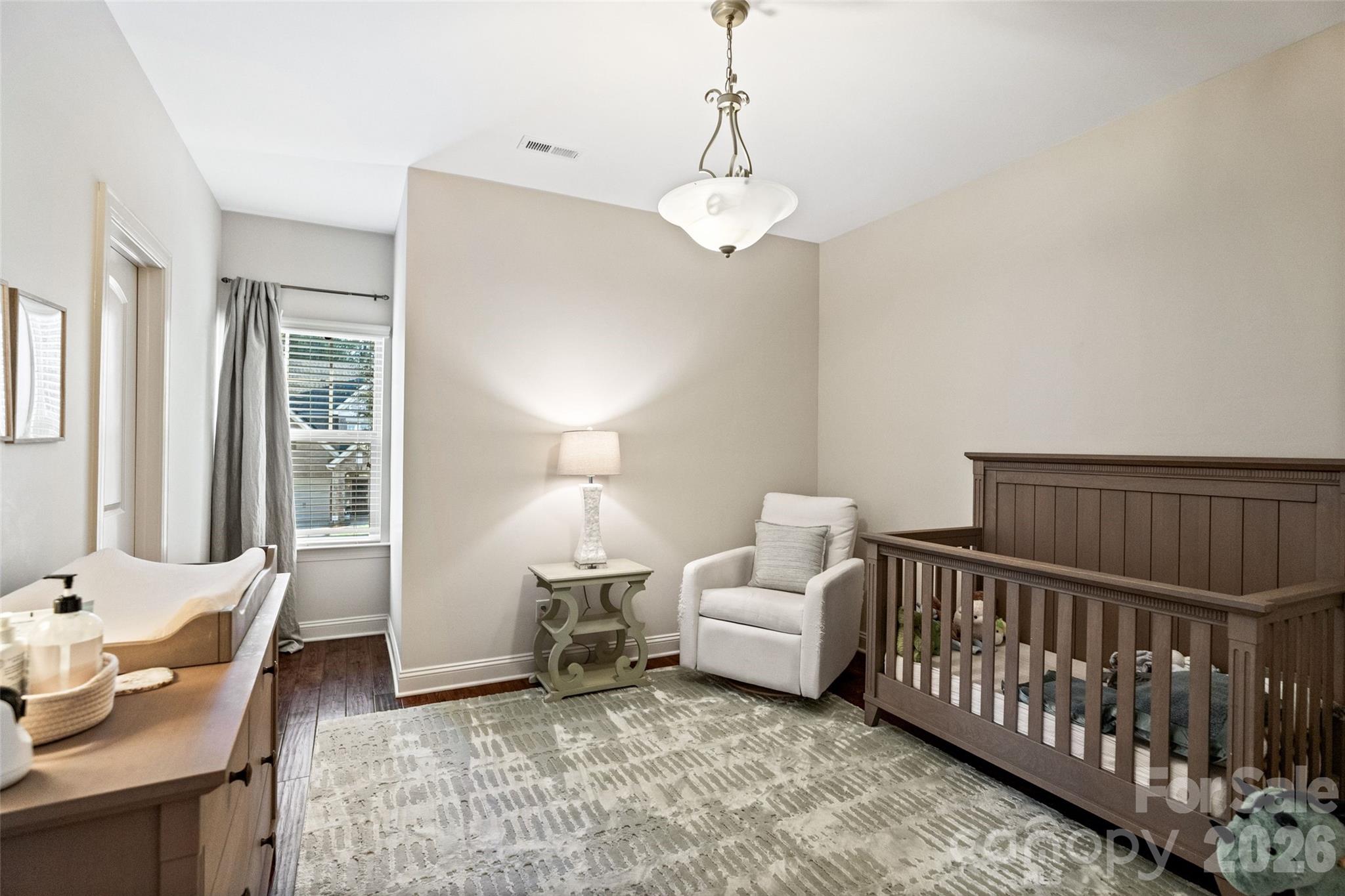 9104 Blue Ridge Drive Indian Land, SC 29707 - Photo 30 of 41 a living room with furniture and a window