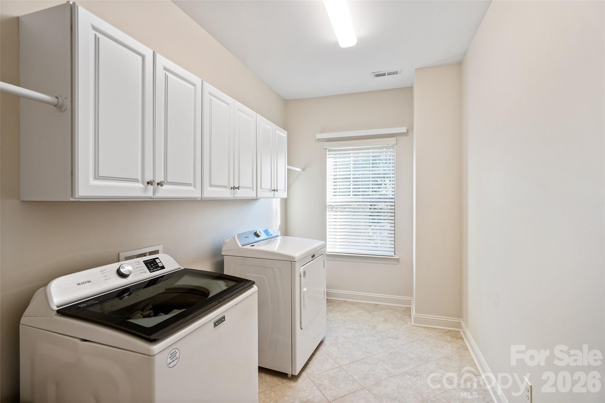 9104 Blue Ridge Drive Indian Land, SC 29707 - Photo 31 of 41 a kitchen with white cabinets and sink