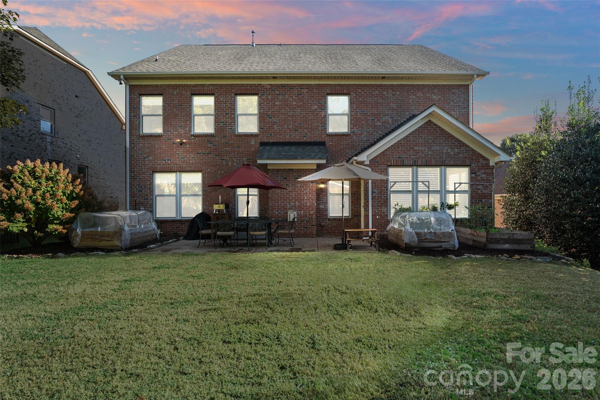 9104 Blue Ridge Drive Indian Land, SC 29707 - Photo 41 of 41 a front view of a house with a garden