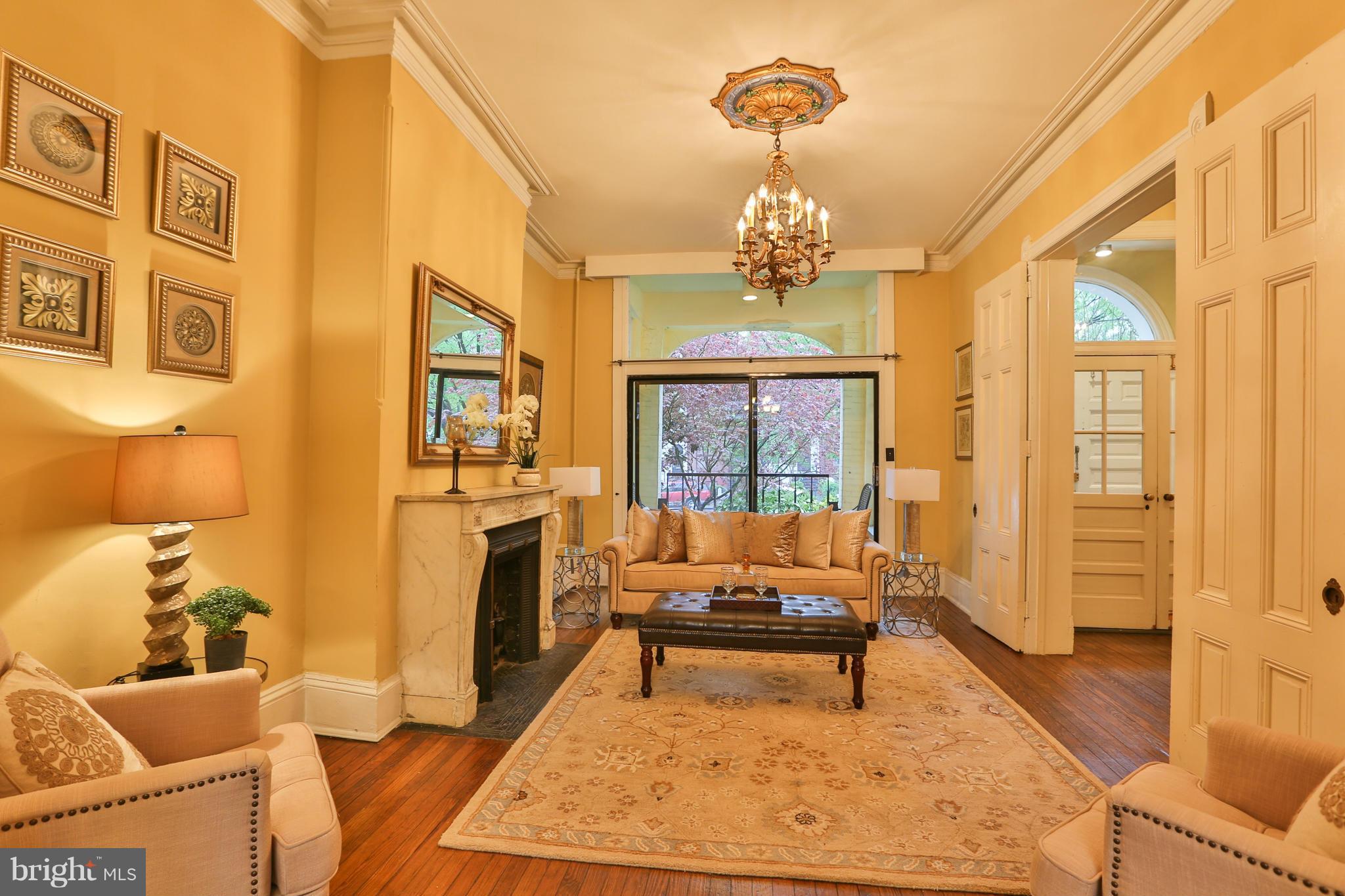 436 New Jersey Avenue Southeast Washington, DC 20003 - Photo 4 of 13 a living room with furniture and a fireplace