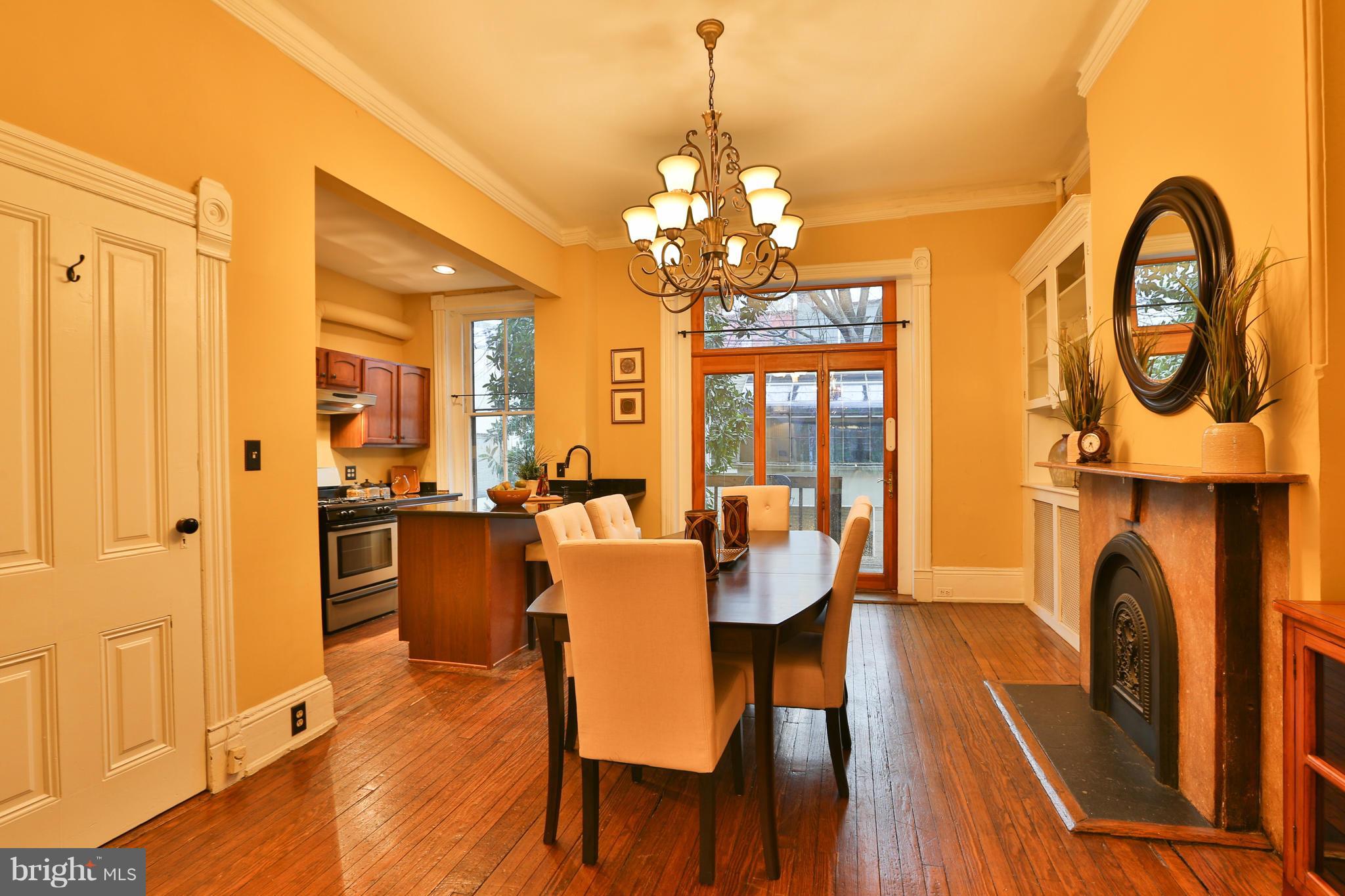 436 New Jersey Avenue Southeast Washington, DC 20003 - Photo 7 of 13 a view of a dining room with furniture window and wooden floor