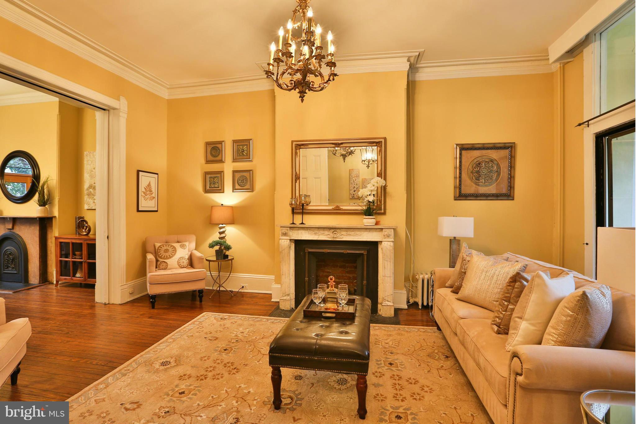 436 New Jersey Avenue Southeast Washington, DC 20003 - Photo 8 of 13 a living room with furniture and a fireplace