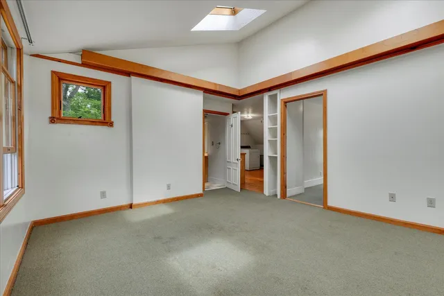 a kitchen with a stove a sink and a refrigerator