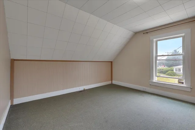 a bathroom with a bathtub and a sink