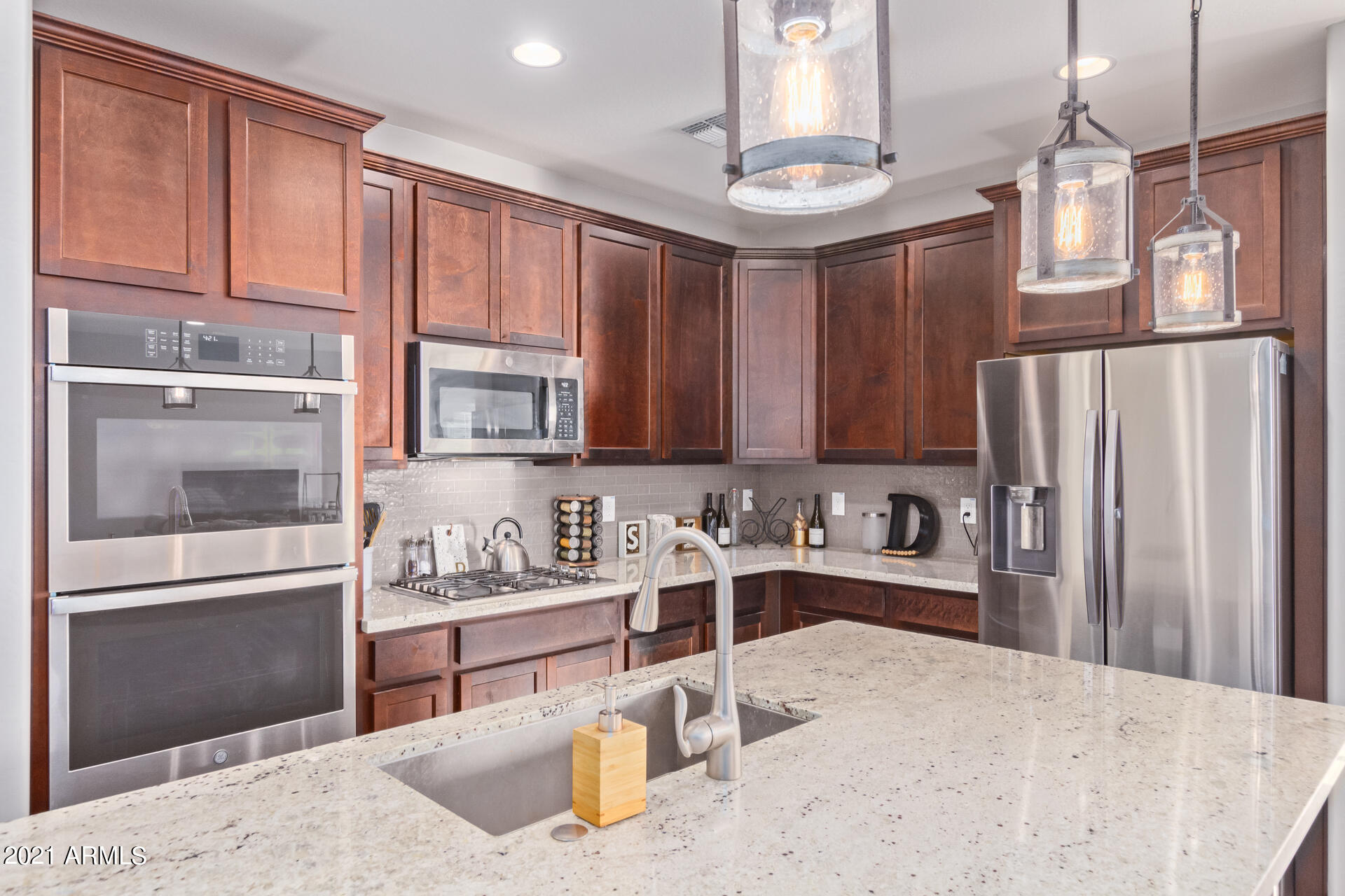 21063 West Berkeley Road Buckeye, AZ 85396 - Photo 2 of 45 HIGHLY UPGRADED GOURMET KITCHEN (2)