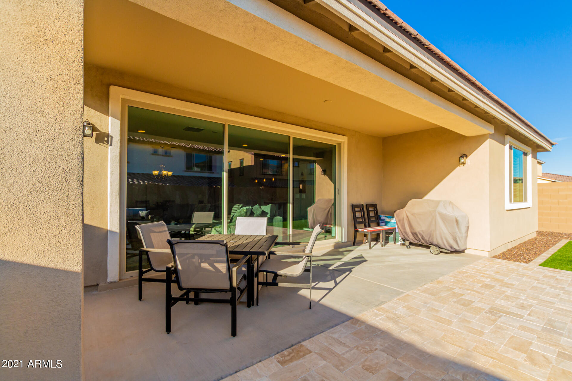 21063 West Berkeley Road Buckeye, AZ 85396 - Photo 28 of 45 HUGE BACK PATIO WITH FULL WALL SLIDER