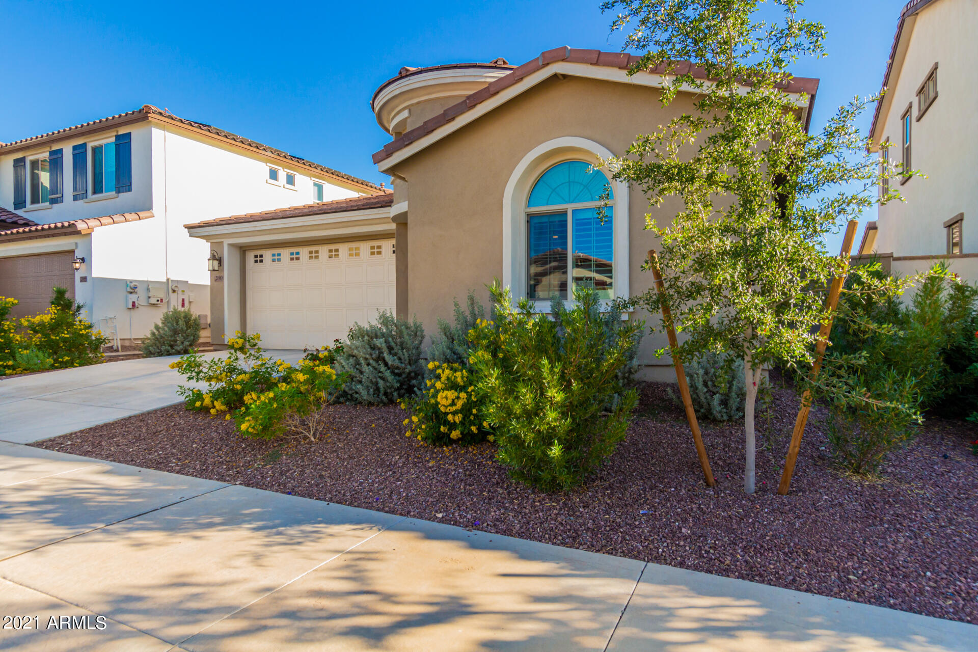 21063 West Berkeley Road Buckeye, AZ 85396 - Photo 8 of 45 LUSH FRONT YARD LANDSCAPING