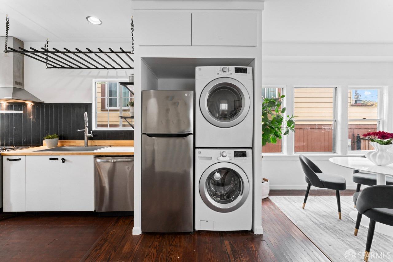 1718 37th Avenue Oakland, CA 94601 - Photo 15 of 33 a view of a kitchen with washer and dryer