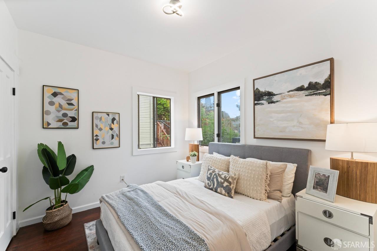 1718 37th Avenue Oakland, CA 94601 - Photo 24 of 33 a bedroom with furniture and a window