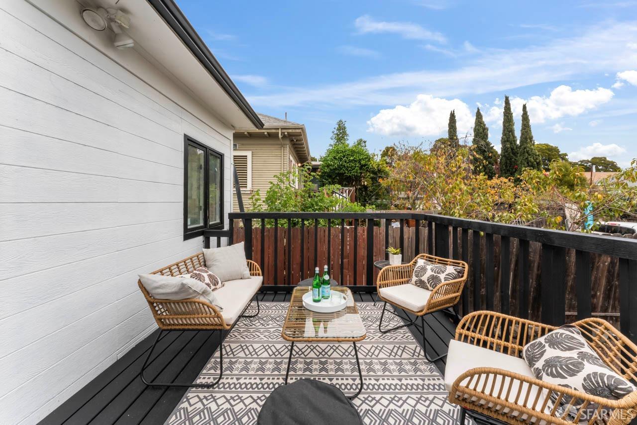 1718 37th Avenue Oakland, CA 94601 - Photo 27 of 33 a view of balcony with wooden floor