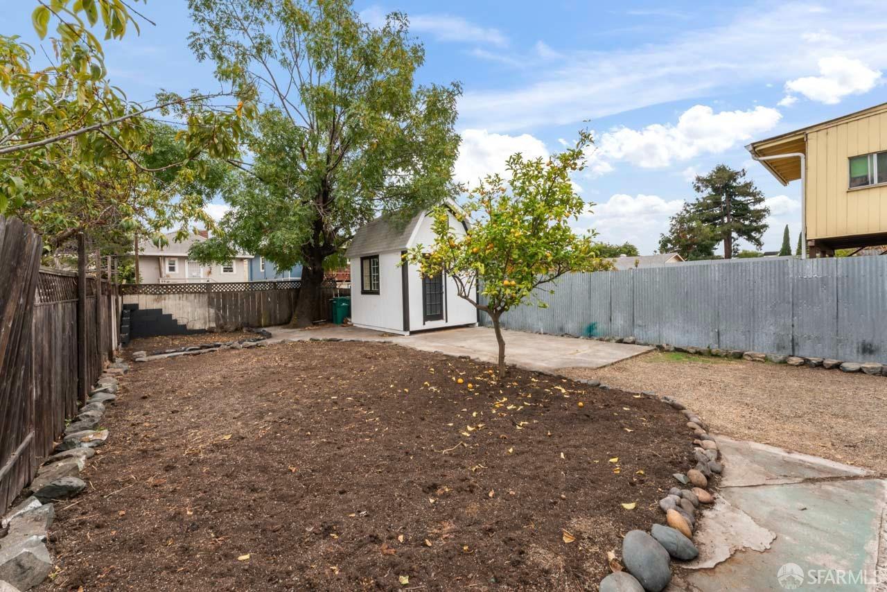 1718 37th Avenue Oakland, CA 94601 - Photo 29 of 33 a view of a yard with plants and trees