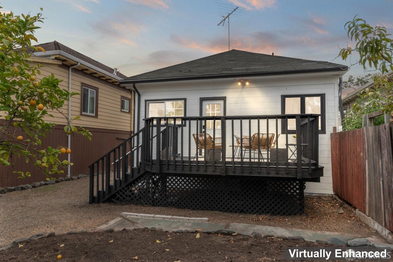1718 37th Avenue Oakland, CA 94601 - Photo 30 of 33 a view of a wooden house with a large window