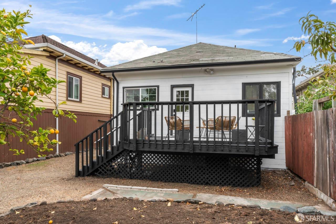 1718 37th Avenue Oakland, CA 94601 - Photo 31 of 33 a view of a house with a wooden deck