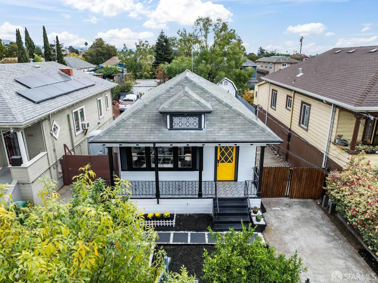 1718 37th Avenue Oakland, CA 94601 - Photo 4 of 33 an aerial view of a house with swimming pool and sitting area