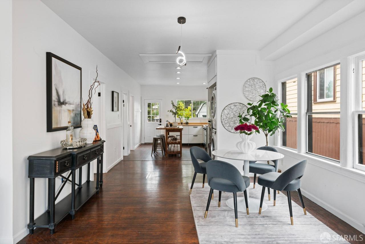 1718 37th Avenue Oakland, CA 94601 - Photo 10 of 33 a view of a dining room with furniture window and wooden floor