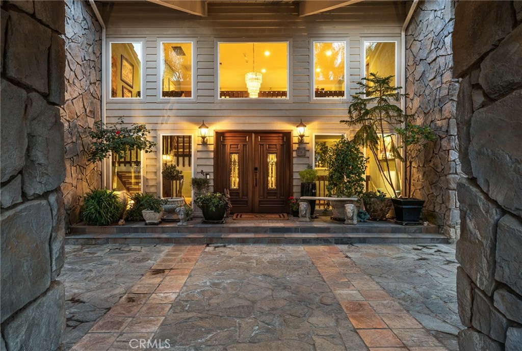 1457 Crestview Road Redlands, CA 92374 - Photo 8 of 60 Entry under the portico with natural lighting