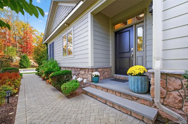 a view of a chair and table in the patio