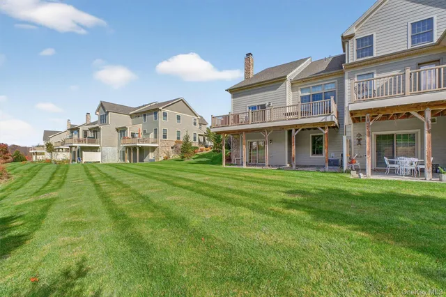 a view of a building with a yard