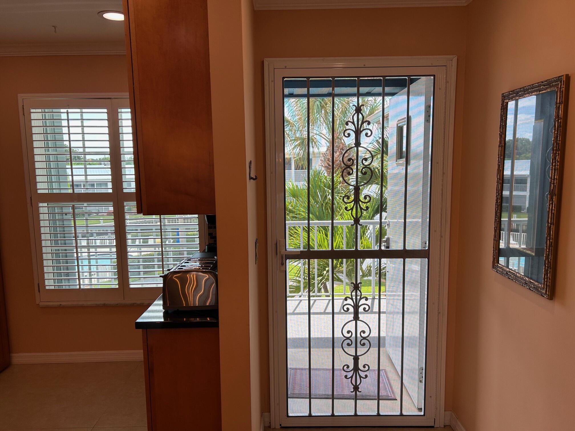 1868 Southwest Palm City Road, Unit 304 Stuart, FL 34994 - Photo 11 of 27 Windjammer Kit Entr