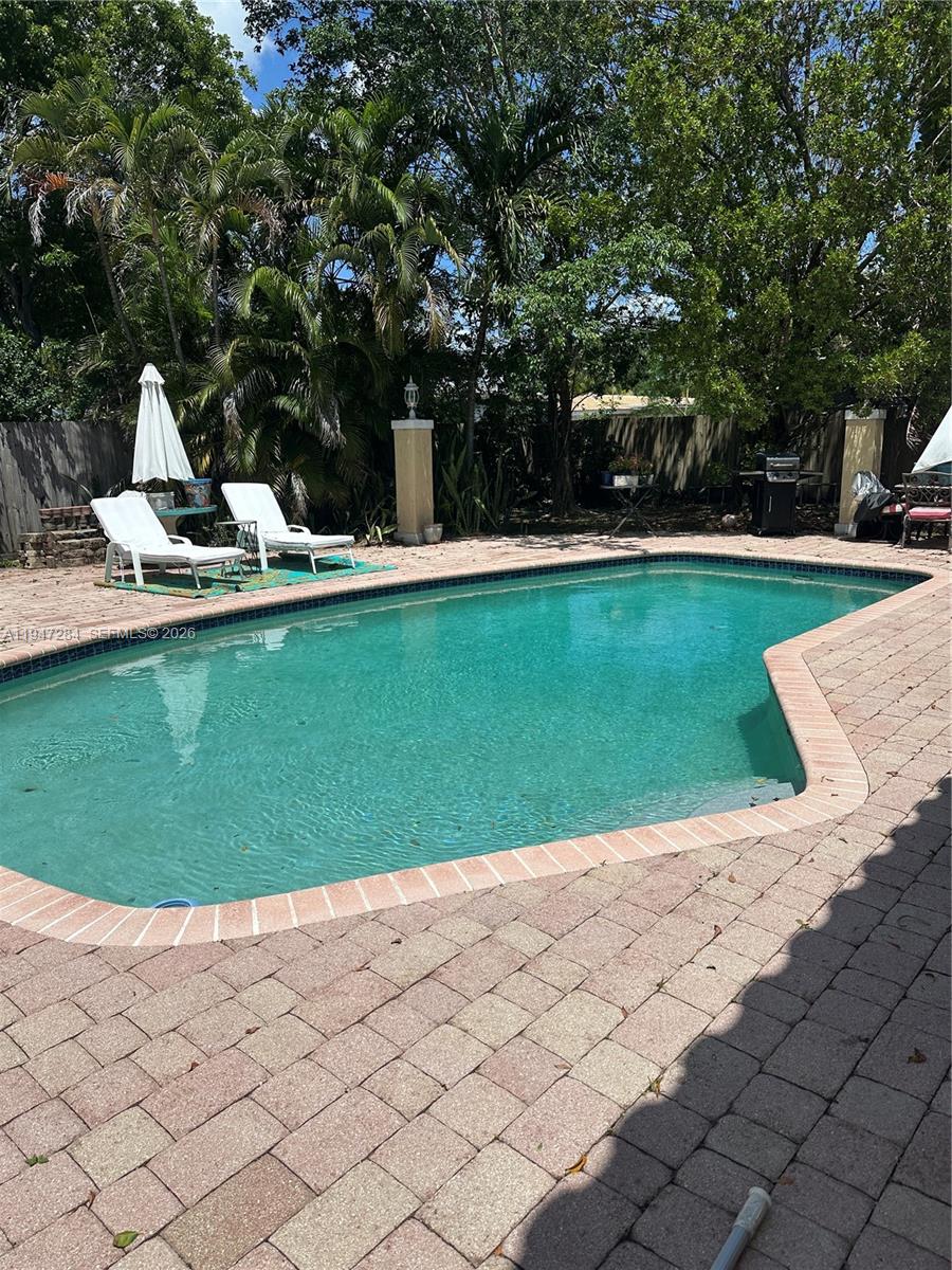 2501 Northeast 22nd Street Pompano Beach, FL 33062 - Photo 2 of 4 a view of a park with large trees